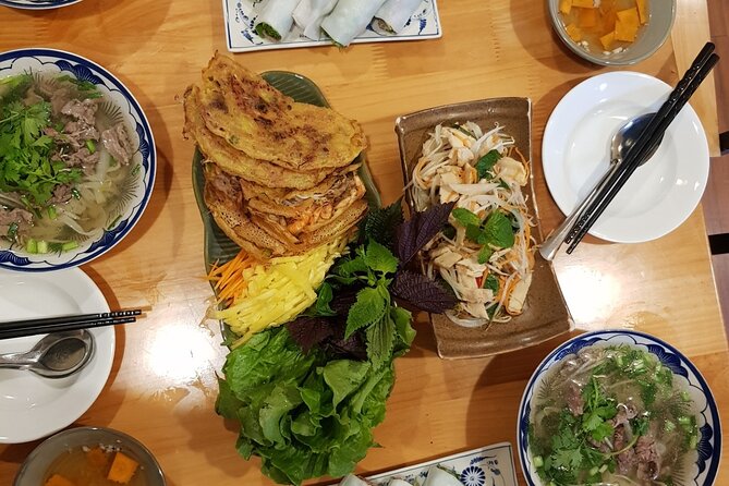 5 traditional dishes Da Nang cooking class with market trip - Market Time at Chợ Bắc Mỹ An: Buying Ingredients With Meaning