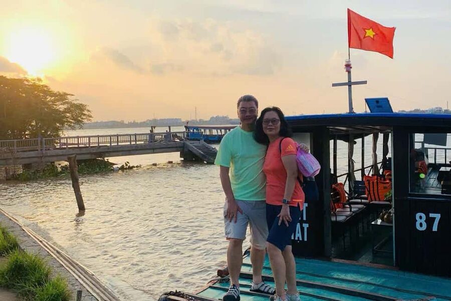 Authentic Mekong Delta: Tuk Tuk, Rowing Boat, Biking Tour - Coconut candy workshop, honey tea, and slow rowing under palms
