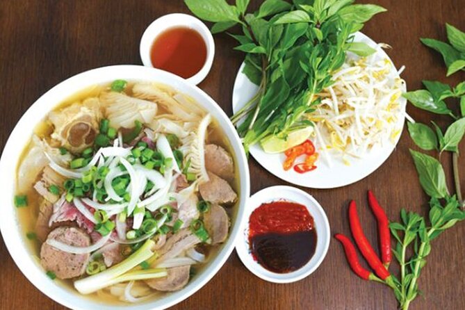 Da Nang Fully Local Experience with Friendly Females Riders - Tran Thi Ly Bridge and APEC Park Photo Stops