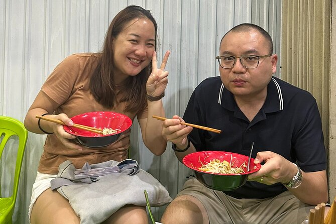 Da Nang Local Food Tour by Motorbike + Sightseeing SAFE & FUN - Helio Center, Walking Bridge, and Sun Wheel viewpoint riding