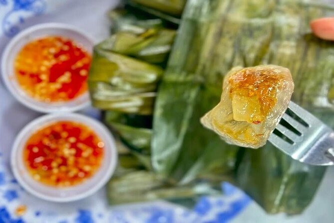Da Nang Night Foodie Tour City and Han River Cruise By Private - APEC Park with kite shapes: a lighter, scenic pause
