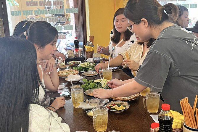 Da Nang Scooter Food Tour & Hidden Gems w/ Locals - Nem Nướng on Đường Lê Duẩn: learn the wrap and dip