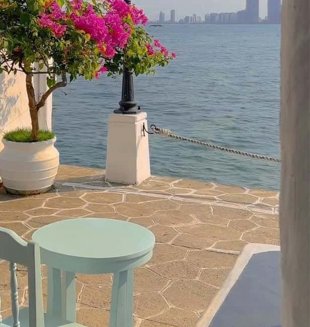 Discover Son Tra: Legendary US Army Jeep Adventure Tour - Son Tra Marina coffee stop: boats, water, and a Santorini-style cafe