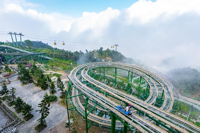 Entry ticket: Ba Na Hills and Golden Bridge Cable Car - Arrival at Ba Na Hills: Buddha statue and flower gardens
