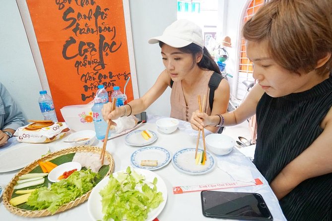 Evening Walking Food Tour, folk game and lantern boat - Getting oriented: White Rose Restaurant and a smooth 4:30 pm start