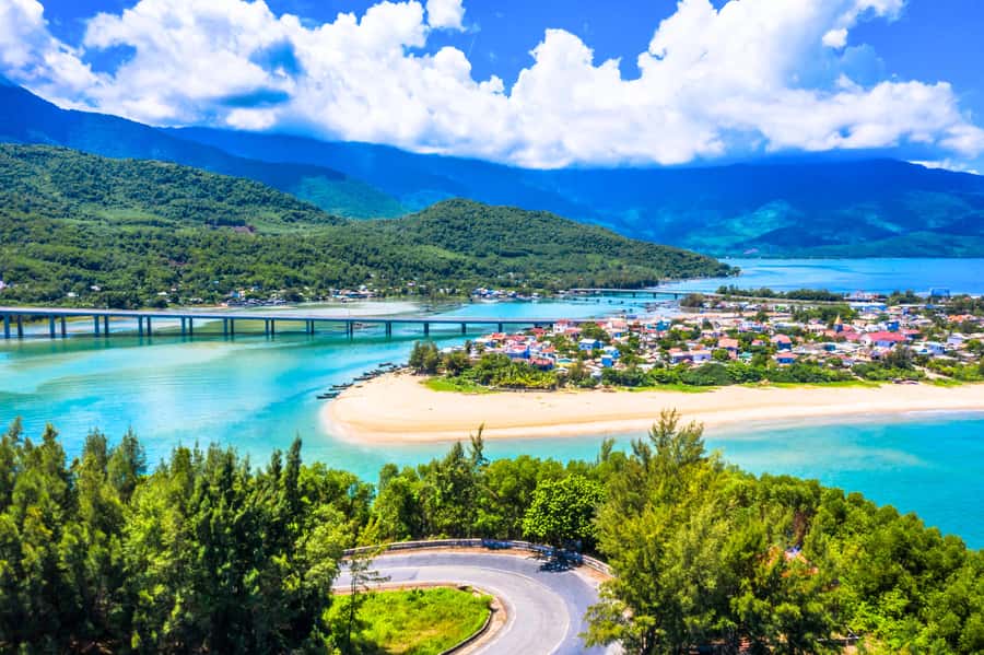 From Hue: Hoi An Guided Bus Tour with 4 Scenic Stops - Lap An Lagoon: A Quick Coast Reset and a Practical Beach Break
