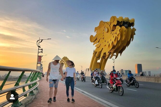 Full Day Da Nang Vietnamese Private Cooking Class Highlight Tour - Love Lock Bridge at night: a romantic walk with local charm