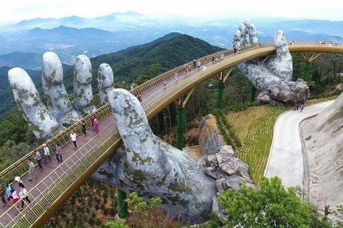 GOLDEN BRIDGE & BA NA HILL via CABLE CAR from DA NANG or HOI AN (Private Tour) - French village, botanic gardens, wine cellars, and the carnival performance