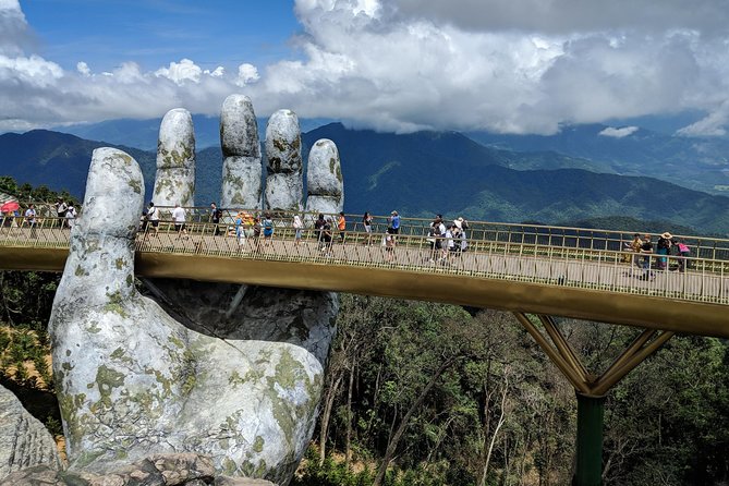 Golden Bridge & Ba Na Hills 1 Day including buffets lunch & 2 ways Cable Car - Morning stops: French Village, gardens, and Linh Ung