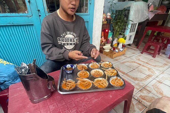 Half-day Private Street Food Tour in Hoi An - Bánh Xèo Nem Lụi at 49 Trần Hưng Đạo, built for rolling and sharing