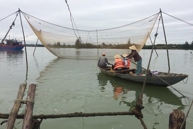 Hoi An Buffalo Riding & Basket Boat Tour with local home cooking - On the Cua Dai River: bamboo basket boat rowing, up close