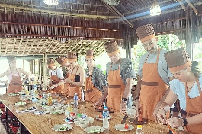 Hoi An Cooking Class with Market Visit - The cooking class at the restaurant, from ingredients to plates