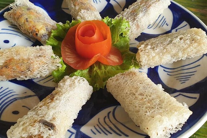Hoi An/Da Nang: Vegetarian Cooking Class & Basket Boat Ride - Basket boat riding at Cam Thanh: narrow channels, palm-leaf crafts, and crab spotting