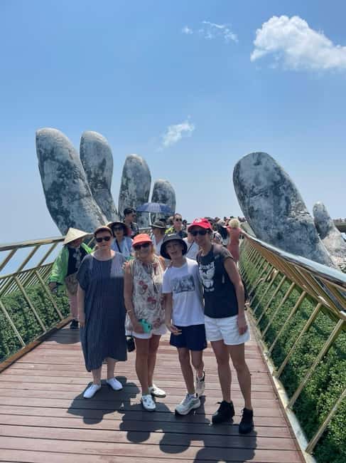 Hoi An/DaNang: Private Car Marble Mountain & Golden Bridge - Inside the French Village: street music, statues, and the gardens