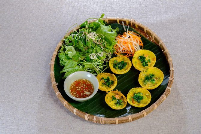 Hoi An Food Tour by Motorbike with Tastings and Dinner - Beyond the main lanes: pagoda stop plus pancake and egg dish