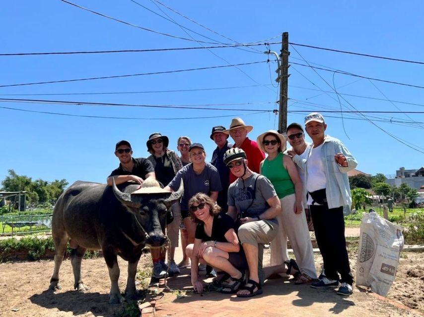 Hoi An: Half-Day Countryside Tour by Motorbike - Cua Dai bridge photo pause: your view back to Hoi An and Cu Lao Cham