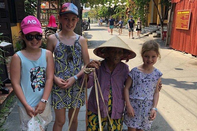 Hoi An Night Market with Hoi an walking Tour , Colourful Lanterns, Boat Ride - The Hoai River Sampan Ride: Lantern Wishes on the Water