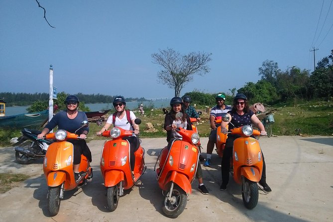 Hoi An Nightlife And Food Tour By Electric Scooter - Karaoke stop: culture, energy, and the volume check