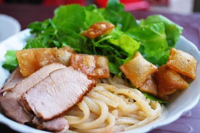 Hoi An Street Food Tour By Scooter - Stop 1: Hoi An Night Market, where the evening energy starts