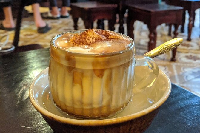 Hoi An Street Food Walking Tour with Local Foodies - Stop 5: Trí Long Coffee, finishing with Vietnamese drinks instead of another heavy plate