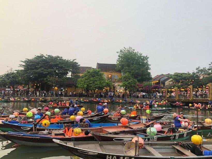 Lantern Release and Night River Boat Experience in Hoi An - Watching the lantern join the stream of liquid light