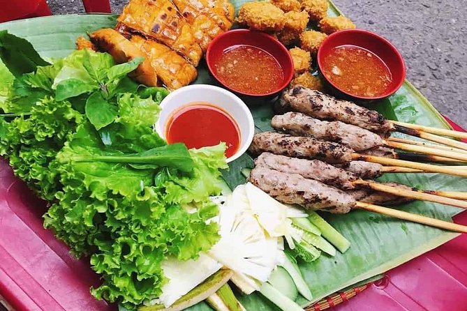 Let's eat LIKE a Vietnamese - Explore Foods Tour - City sightseeing and bridge views at night, without turning it into a spectacle