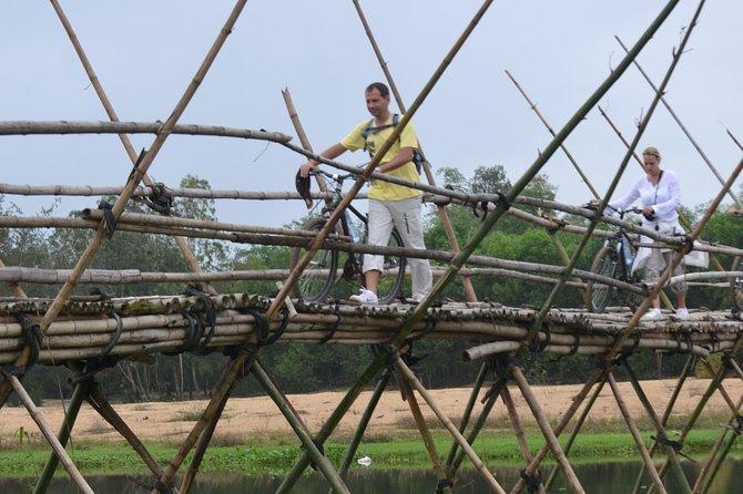 Mountain Bike Riding from Hoi An - Bridge crossings and island time: the scenes that change the trip