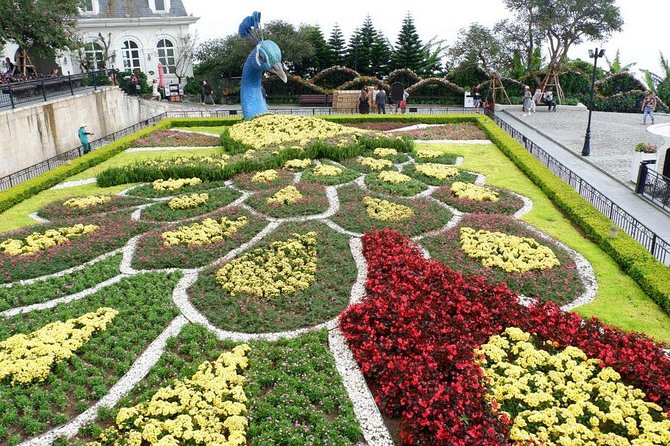 Private guided Sunworld Ba Na Hills & Golden Hands Bridge - Le Jardin D’Amour and Debay Wine Cellar: French flair beyond the postcards