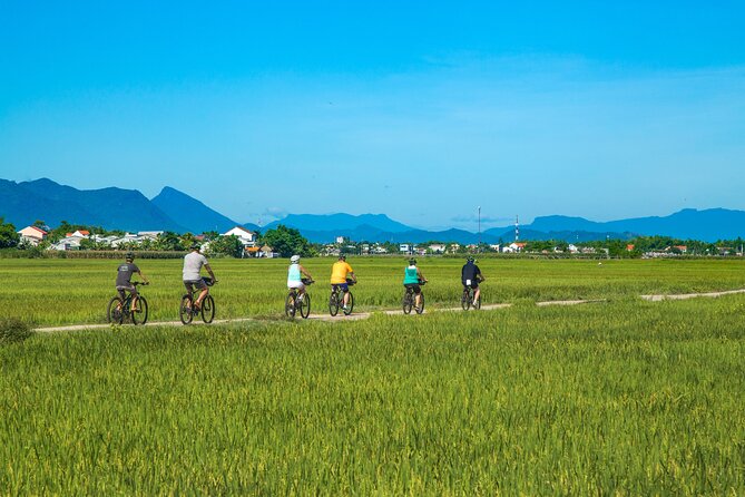 Private Hoi An to My Son Sanctuary Full-Day Bike Tour - Hoi An riverfront and alleyways, before the city crowds land