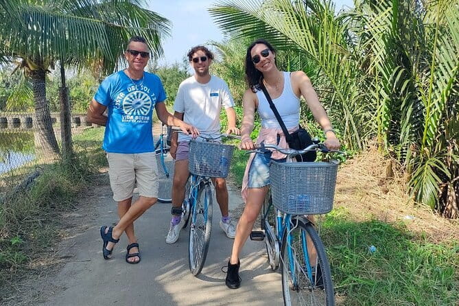 Small Group Bicycle Tour with Farming and Fishing Experience - Water buffalo moments and palm-thatched house making