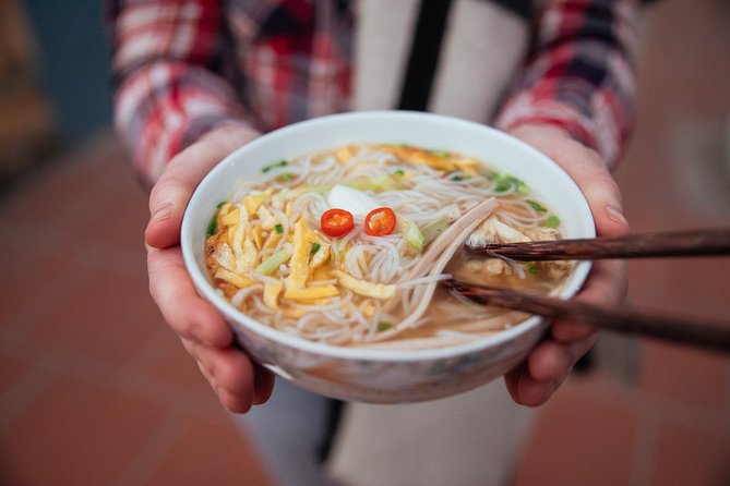 The 10 Tastings of Hoi An: Private Street Food Tour - The city stops between meals: pagodas, bridges, wells, and assembly halls