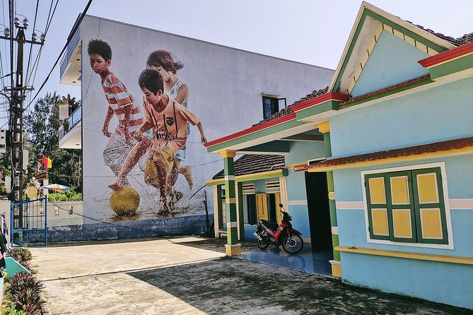 Visiting Tam Thanh mural village - Mother Thu monument - Stop 1: The Vietnamese Heroic Mother statue and the story behind it